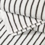 white and lined towel