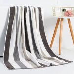 white and gray stripped towel