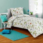 white and green embroidered bedsheet