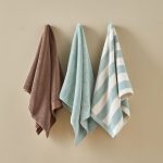 multi colored plain and stripped towels