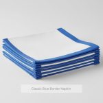 white napkins with blue borders